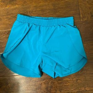 All in Motion kids teal athletic shorts size 10/12/L